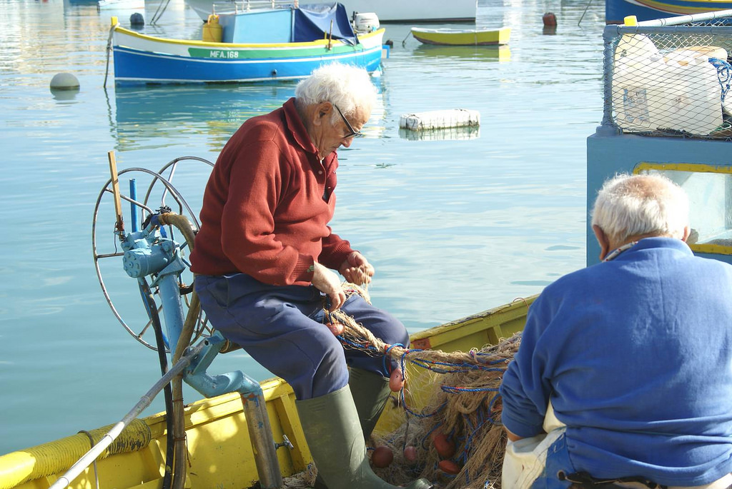Fishermen in Żejtun, Malta. Photo by Ramon Casha, Flickr.
